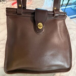 Vintage Coach Brown Leather with Brass accents highly sought after priced well